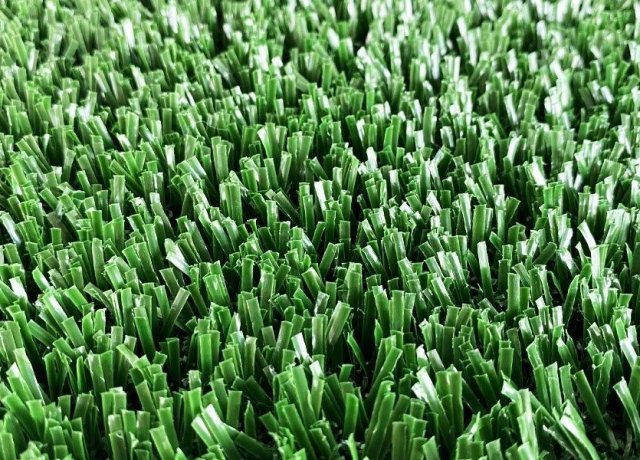 Curly and monofilament fibers for artificial grass football