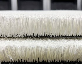 Dense white turf for artificial ski training slopes