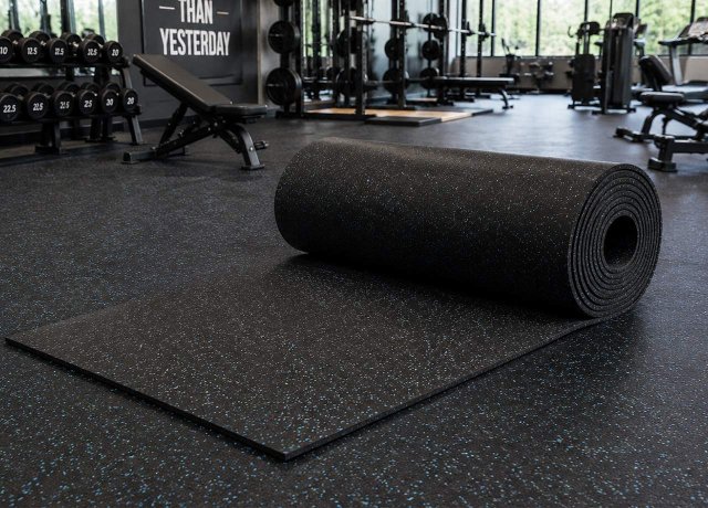 Shock absorbing gym flooring rolls for fitness centers
