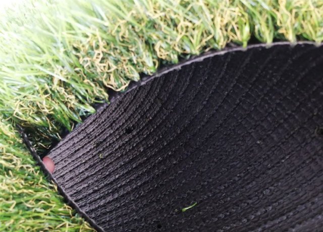 Pet friendly artificial grass with soft PE fibers for comfortable outdoor pet spaces