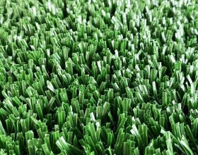 Curly and monofilament fibers for artificial grass football