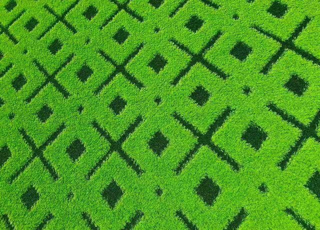 Artificial grass carpet roll with 3D embossed texture for easy outdoor installation