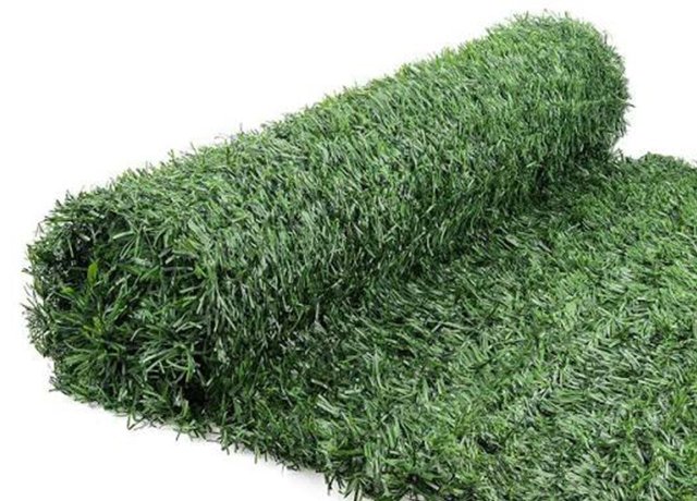 Natural-looking fake conifer screening for patio fences