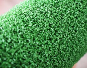 Durable synthetic turf surface for tennis court applications