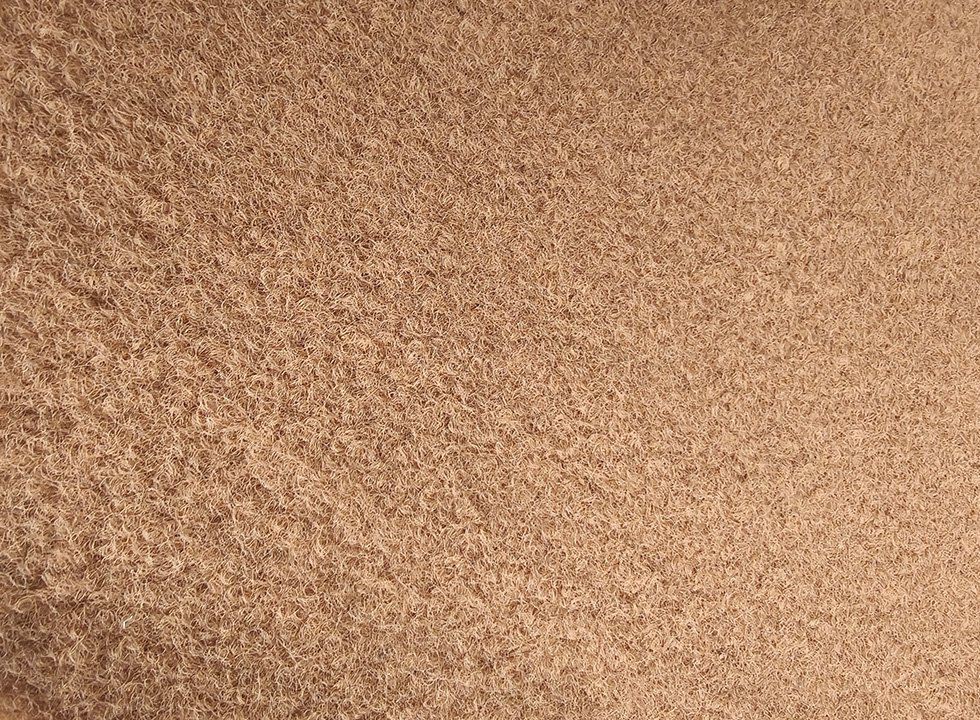 Reclaimed calcium base gold-coated carpet